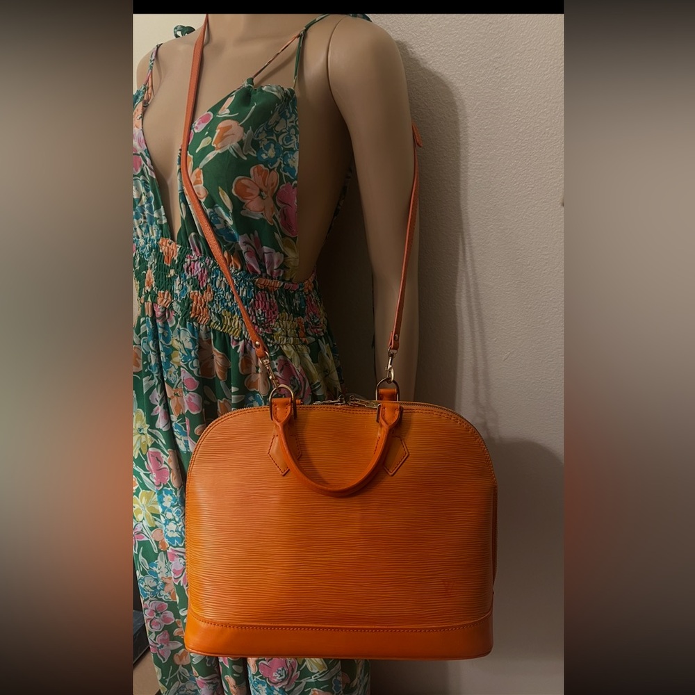 Pre-loved authentic LV Epi Alma PM orange